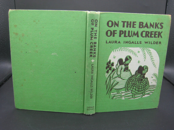 On the Banks of Plum Creek (Used Hardcover) - Laura Ingalls Wilder
